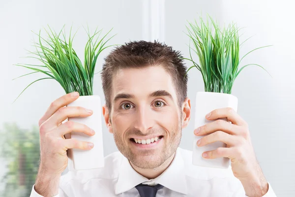 Businessman with green attitude — Stock Photo, Image