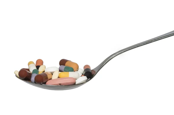 Spoon With Pills Capsules And Tablets Isolated On White — Stock Photo, Image