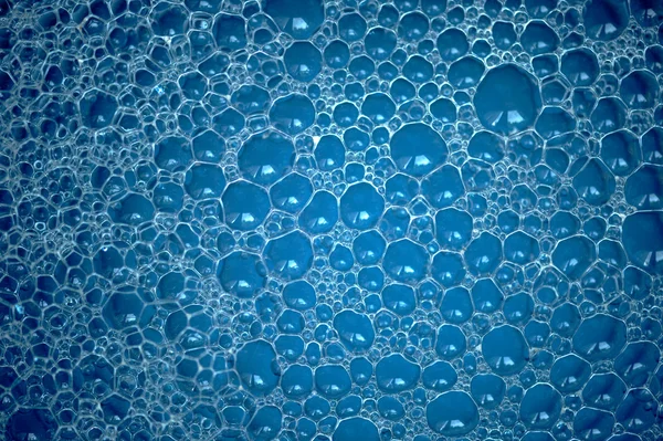 Аннотация Blue Soap Bubbles Background Стоковая Картинка