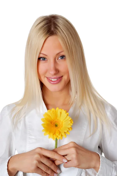 Portrait of goregous young lady holding a yellow flower isolated on white background — Stock Photo, Image