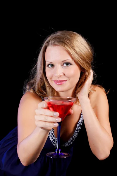 A charming young lady holding a glass of red wine — Stock Photo, Image