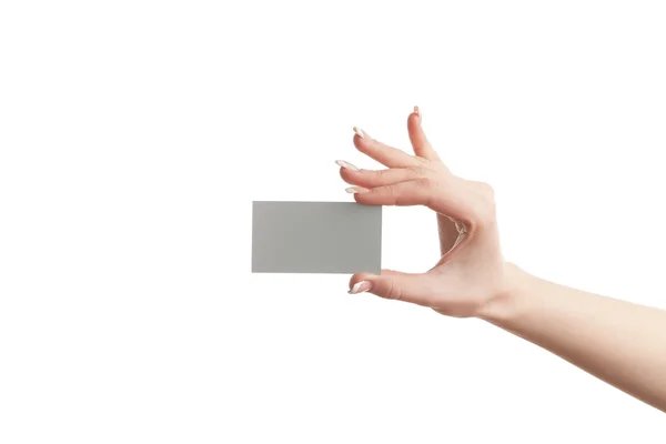 Mão feminina segurando cartão em branco — Fotografia de Stock