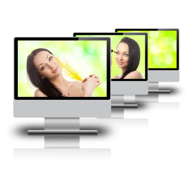 Schöne Frau auf einem Monitor — Stockfoto