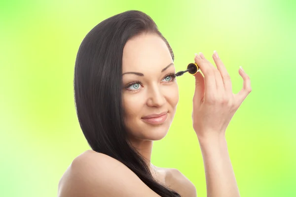 Young beautiful woman with brush for make-up — Stock Photo, Image