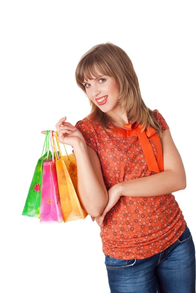 Vrouw met boodschappentassen Stockfoto