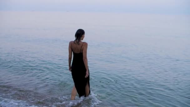 Girl Black Evening Dress Enters Sea Water — 비디오
