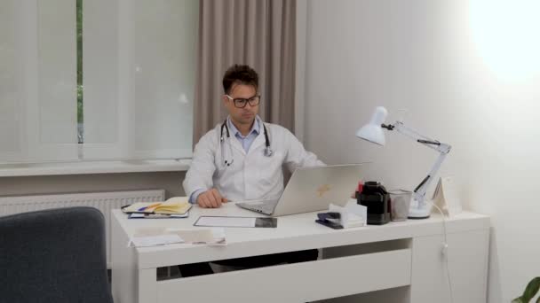 Male Doctor Glasses White Coat His Office Front Laptop Proudly — Wideo stockowe