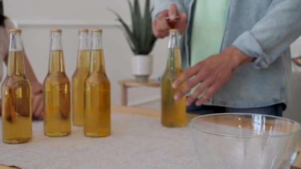 Male Hands Using Opener Opens Bottle Beer — стоковое видео
