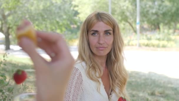 Portrait Girl Who Watches Her Friend Eat Donut Grimace Sadly — Stockvideo