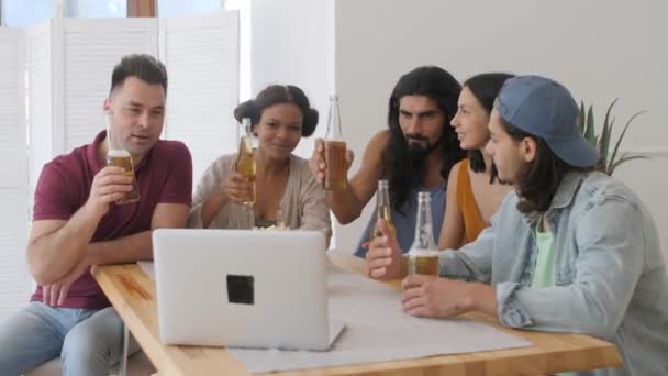 Company Smilingly Holds Out Bottles Beer Camera Laptop — Stock video