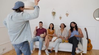 friends playing the game understand me the guy shows gestures without words hidden word