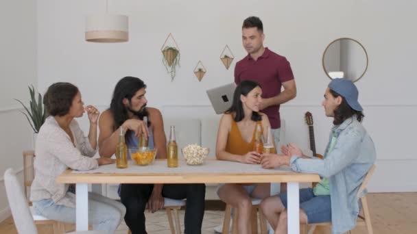 Guy Brings Laptop Video Conference His Friends Puts Table — Vídeo de Stock