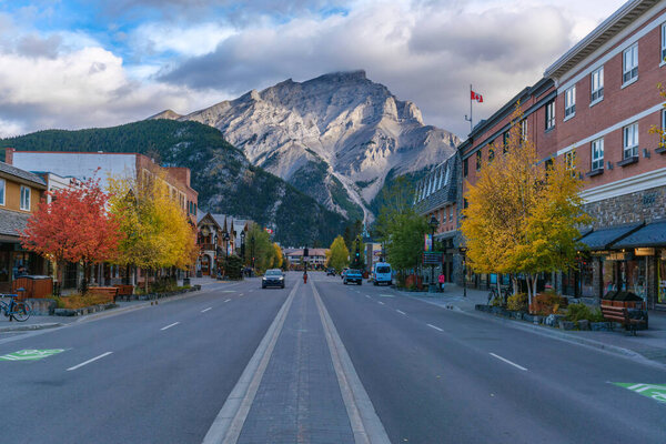 Banff, Canada - 30 September 2021: Banff Avenue and Cascade Mountain during the fall season.