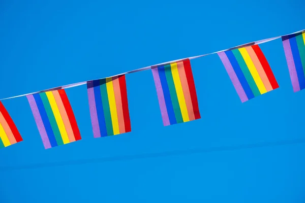 Many Small Gay Rainbow Flags Hanging Blue Sky — Stock Photo, Image