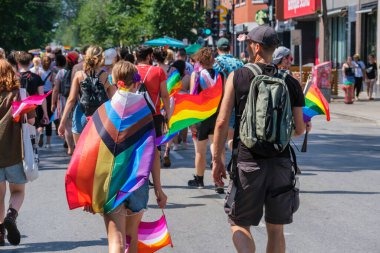 Montreal, CA - 7 August 2022: Many people take part in spontaneous gay pride march after official pride parade was cancelled