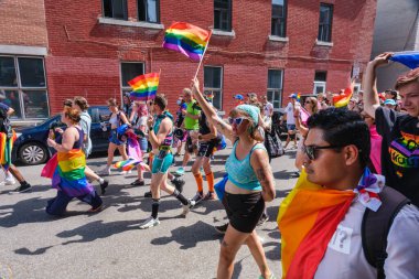 Montreal, CA - 7 August 2022: Many people take part in spontaneous gay pride march after official pride parade was cancelled