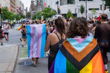Montreal, CA - 7 August 2022: Many people take part in spontaneous gay pride march after official pride parade was cancelled
