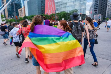 Montreal, CA - 7 August 2022: Many people take part in spontaneous gay pride march after official pride parade was cancelled