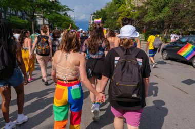 Montreal, CA - 7 August 2022: Many people take part in spontaneous gay pride march after official pride parade was cancelled