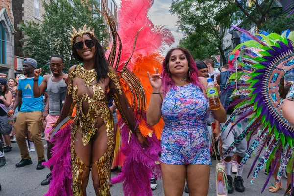 Montreal, CA - 7 August 2022: Two people take part in spontaneous gay pride march after official pride parade was cancelled