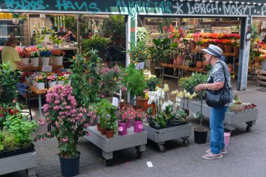 Amsterdam, Netherlands - 21 June 2022: Amsterdam's iconic floating Flower Market was opened in 1862