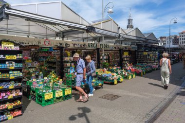 Amsterdam, Netherlands - 21 June 2022: Amsterdam's iconic floating Flower Market was opened in 1862