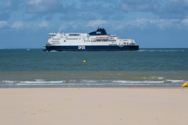 Calais, France - 19 June 2022: DFDS Ferry boat leaving Calais to go to England