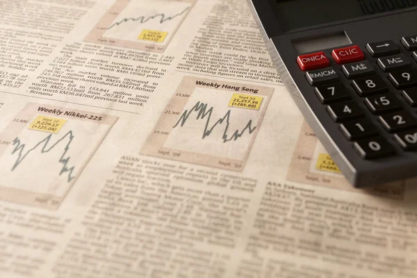 Gazete borsa ile hesap makinası