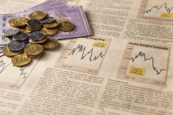 Newspaper stock market with money — Stock Photo, Image