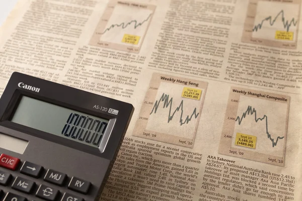 Gazete borsa ile hesap makinası