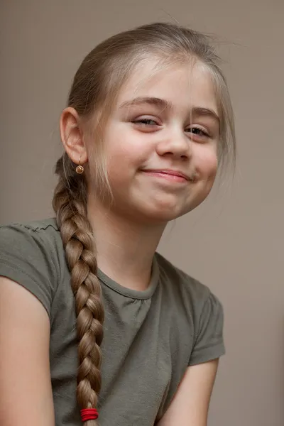 Beautiful smiling girl, hair braided — Stock Photo, Image