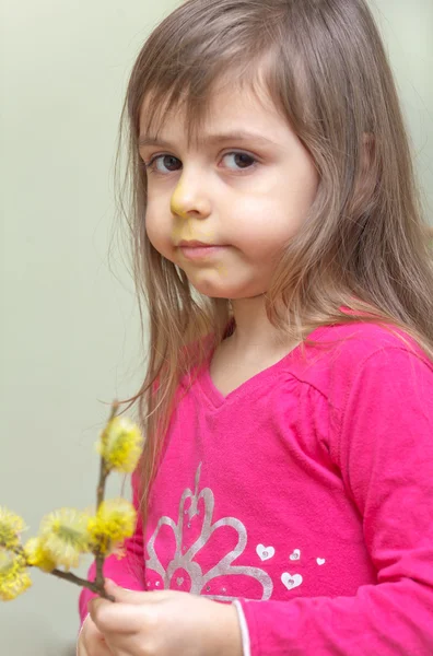 Little girl with pussy willows — Stock Photo, Image