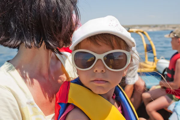 Little girl in life jacket — Stock Photo, Image