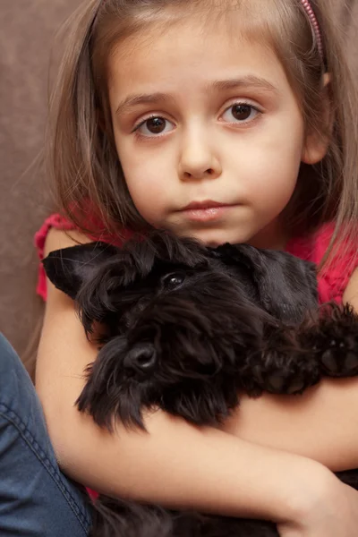 Portrait of a little girl with dog — Stock Photo, Image