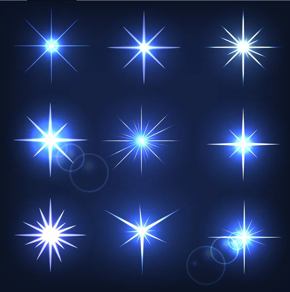 Conjunto de formas de chispas. Estrella brillante sobre un fondo azul — Vector de stock