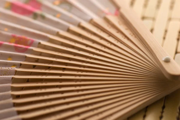 Oriental wooden fan — Stock Photo, Image