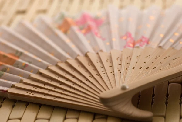 Oriental wooden fan — Stock Photo, Image