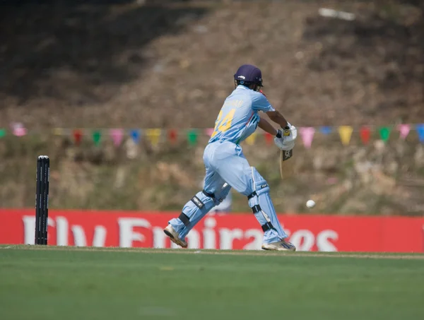 Batsman hitting cricket ball — Stock Photo, Image