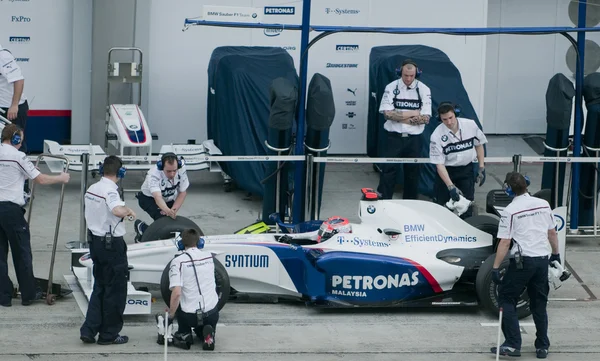 2009 robert kubica op Maleisische f1 grand prix — Stockfoto