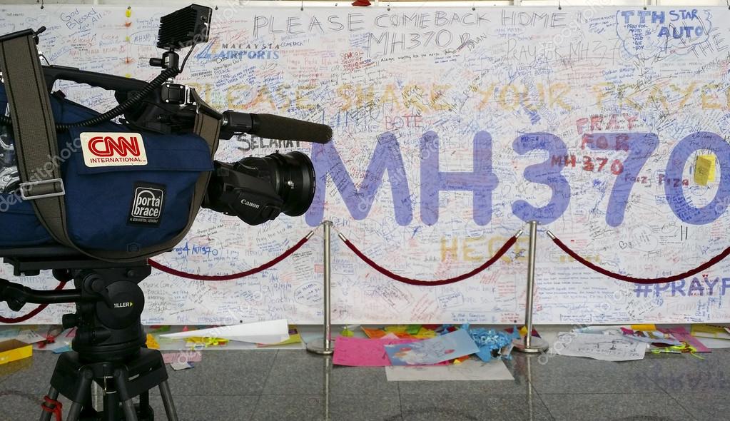 KUALA LUMPUR INTERNATIONAL AIRPORT - MARCH 17: International media CNN do a coverage on the lost Malaysia Airlines Boeing 777-200ER MH370 on March 17, 2014 in KLIA, Sepang, Malaysia.