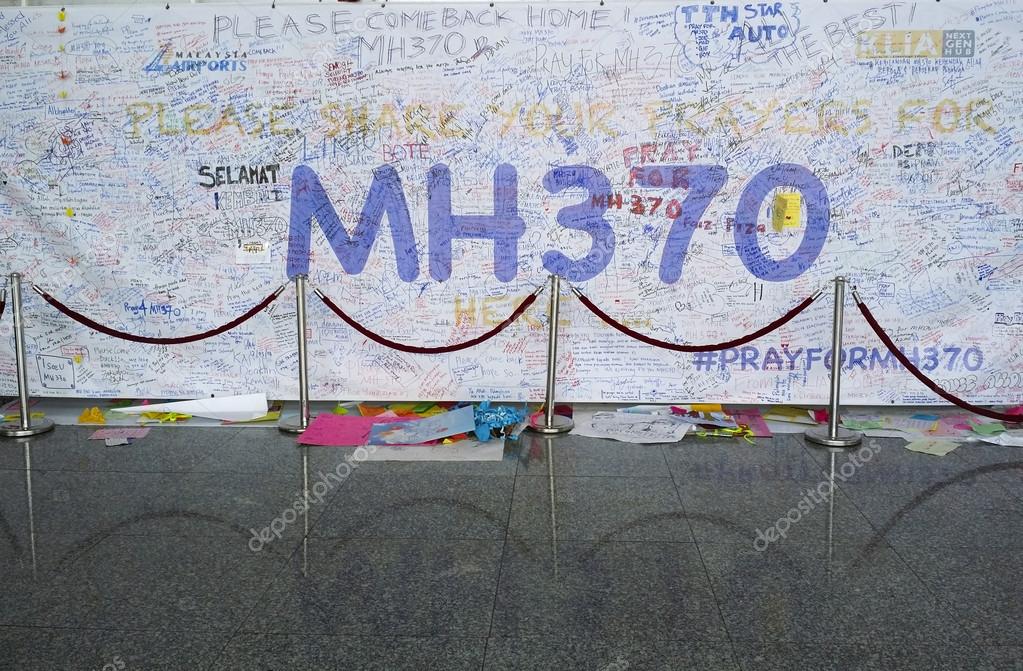 KUALA LUMPUR INTERNATIONAL AIRPORT - MARCH 17, 2014: Support messages and prayers for Malaysia Airlines Boeing 777-200ER MH370 in KLIA, Sepang, Malaysia. The airplane disappeared since March 8.