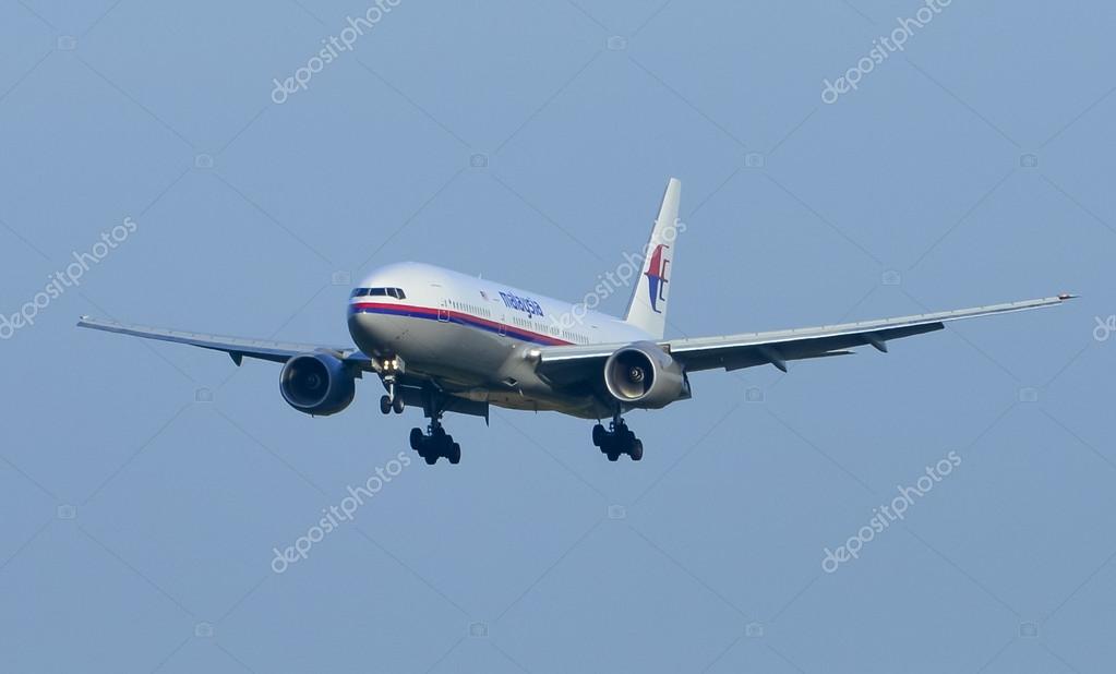 KUALA LUMPUR INTERNATIONAL AIRPORT (KLIA), SEPANG, MALAYSIA- JULY 19: Boeing 777-200ER (9M-MRC) Malaysia Airlines flies over KLIA on July 19, 2014 in KLIA, Sepang, Malaysia.