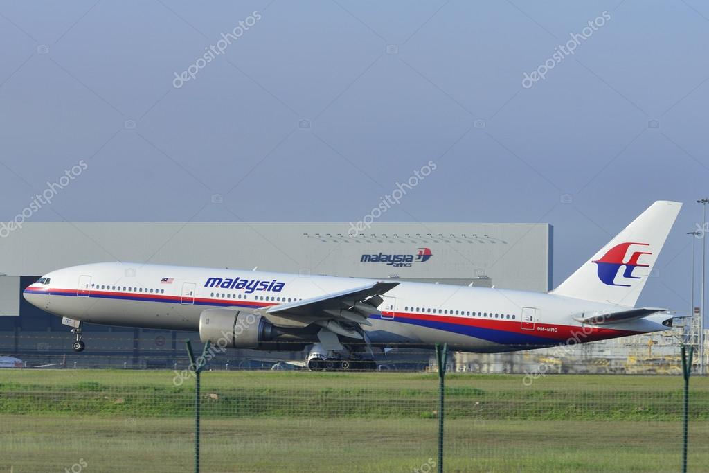 KUALA LUMPUR INTERNATIONAL AIRPORT (KLIA), SEPANG, MALAYSIA- JULY 19: Boeing 777-200ER (9M-MRC) Malaysia Airlines lands at KLIA on July 19, 2014 in KLIA, Sepang, Malaysia.