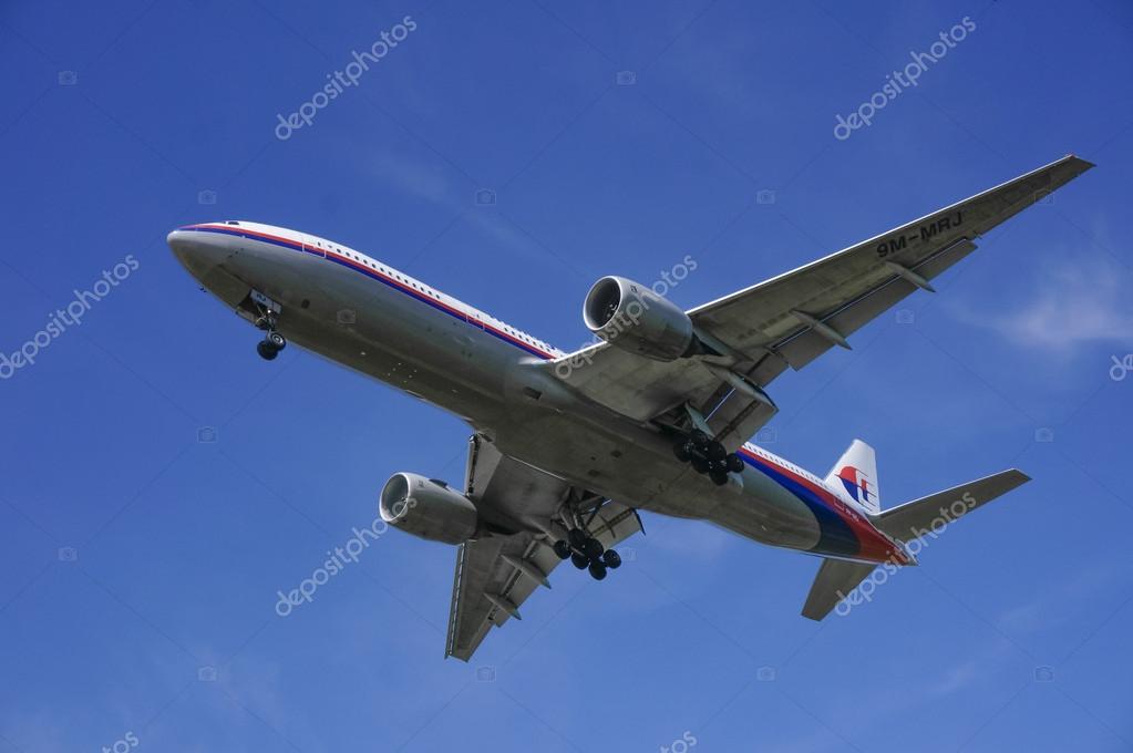 KUALA LUMPUR INTERNATIONAL AIRPORT (KLIA), SEPANG, MALAYSIA- JULY 19: Boeing 777-200ER (9M-MRJ) Malaysia Airlines flies over KLIA on July 19, 2014 in KLIA, Sepang, Malaysia.