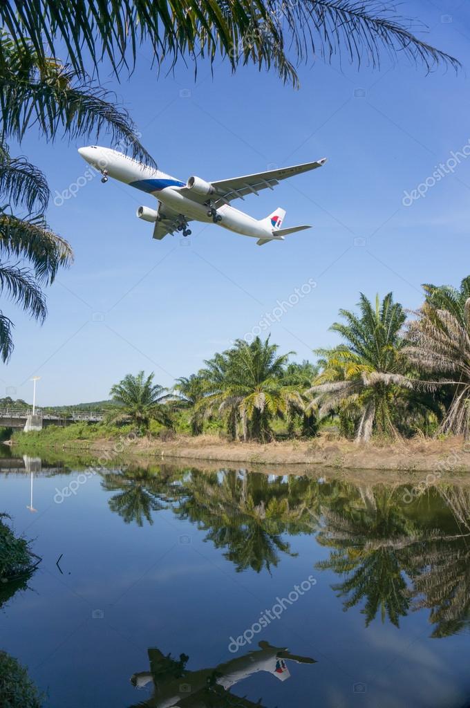 KUALA LUMPUR INTERNATIONAL AIRPORT (KLIA), SEPANG, MALAYSIA- JULY 19: Airbus A330-323X (9M-MTD) Malaysia Airlines flies over KLIA on July 19, 2014 in KLIA, Sepang, Malaysia.