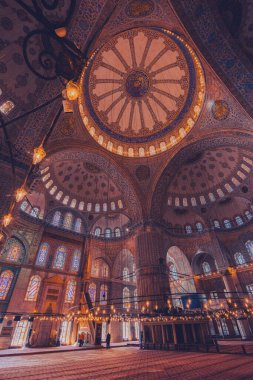 ISTANBUL, TURKEY CIRCA 2014 : Low light photography of interior view of Masjid Sultanahmet mosque (the Blue mosque)  in Istanbul, Turkey