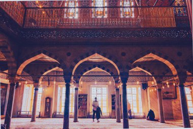 ISTANBUL, TURKEY CIRCA 2014 : Low light photography of interior view of Masjid Sultanahmet mosque (the Blue mosque)  in Istanbul, Turkey