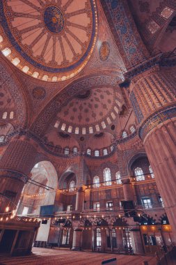 ISTANBUL, TURKEY CIRCA 2014 : Low light photography of interior view of Masjid Sultanahmet mosque (the Blue mosque)  in Istanbul, Turkey