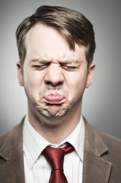 Caucásico hombre puting expresión portrtait — Foto de Stock