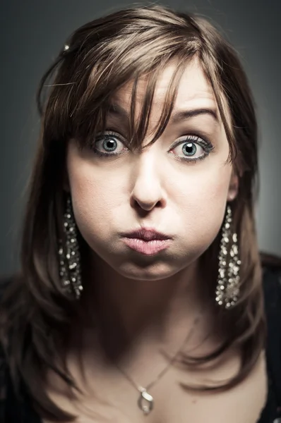 Caucasian Woman Blowing Her Cheeks — Stock Photo, Image